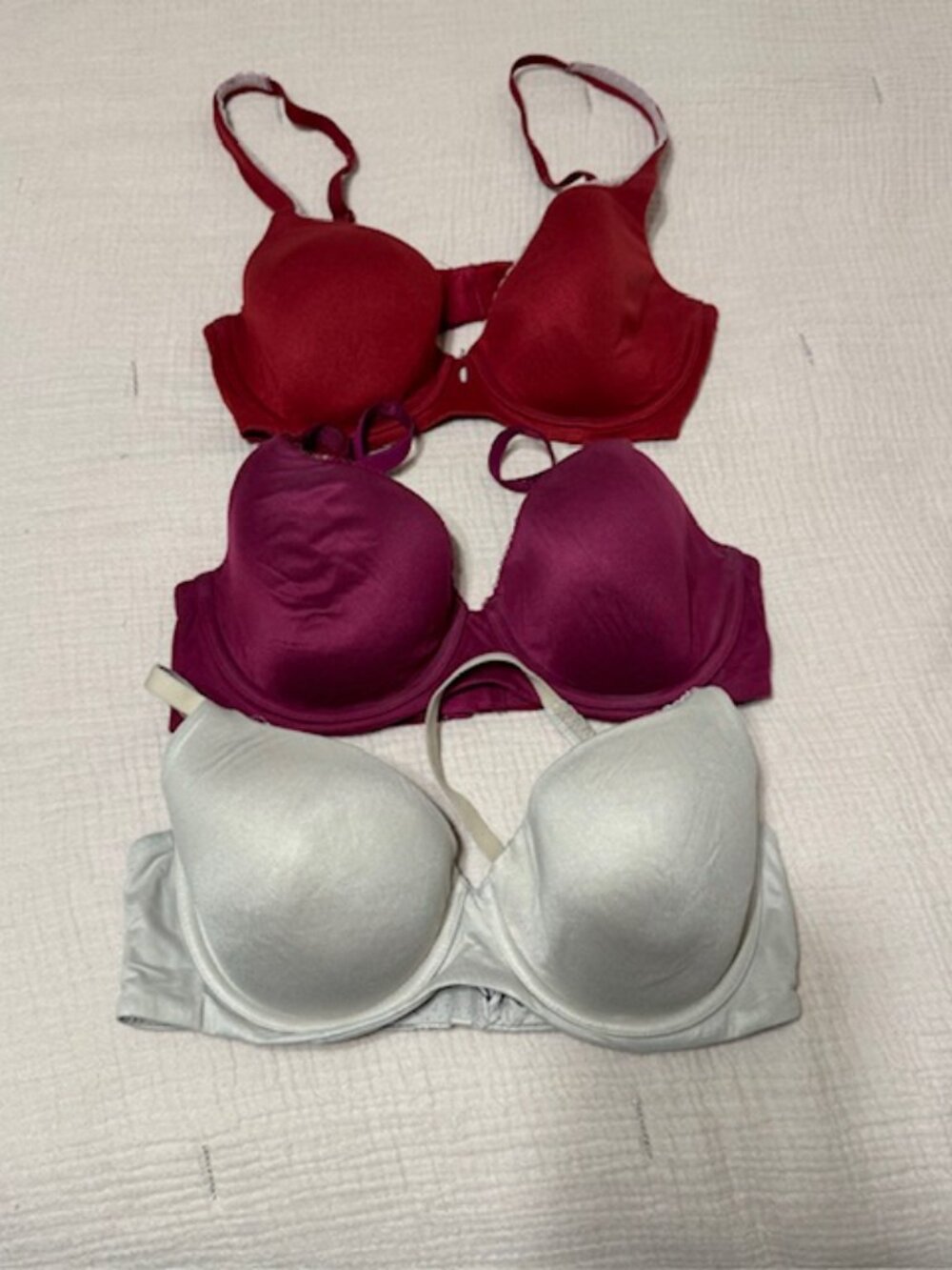 Set of Three Victoria Secrets Red, Purple, and Cream Lined Demi Bras, Size 34D